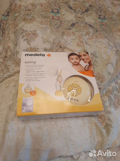 Молокоотсос электрический medela