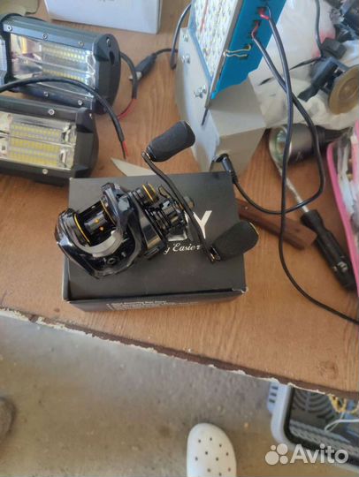 Катушка рыболовная инерционная