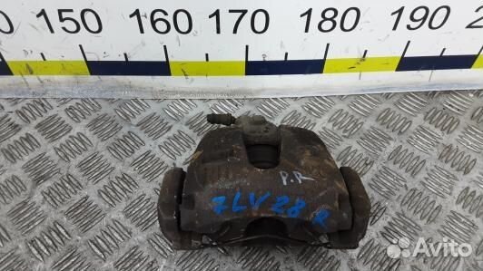 Суппорт тормозной передний правый mazda 3 1 (7LV28