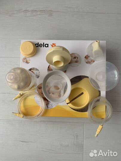 Молокоотсос medela swing электрический