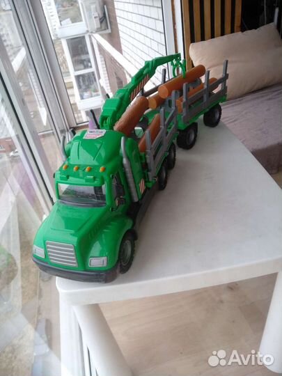 Лесовоз с прицепом брёвнами Полесье