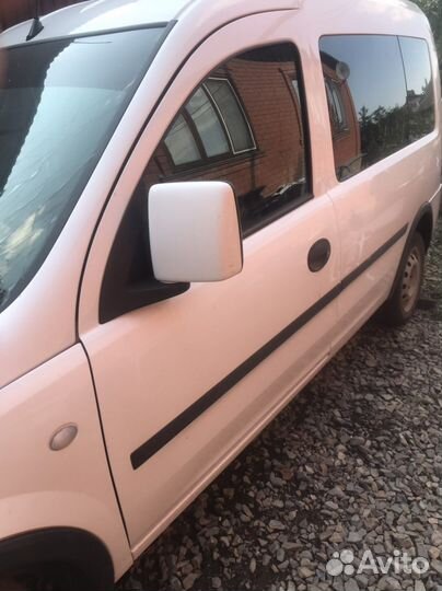 Левая передняя дверь на опель combo