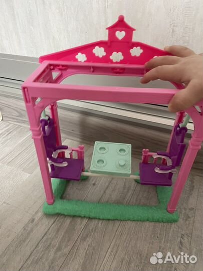 Качеля с куколкой