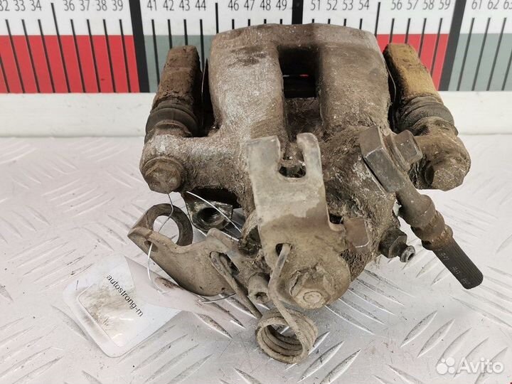 Суппорт задний левый для Opel Meriva A 93179156