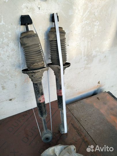 Стойки задние мазда демио