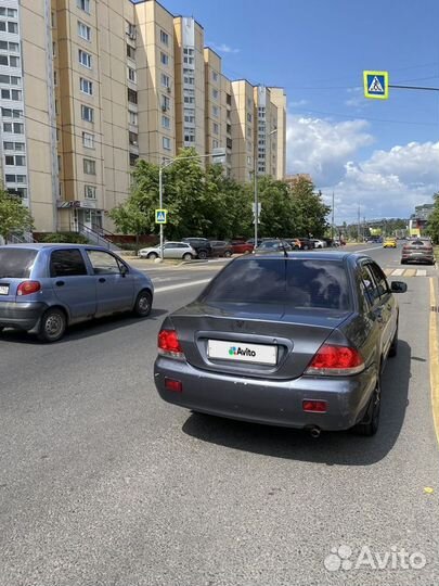 Mitsubishi Lancer 1.6 МТ, 2006, 200 000 км