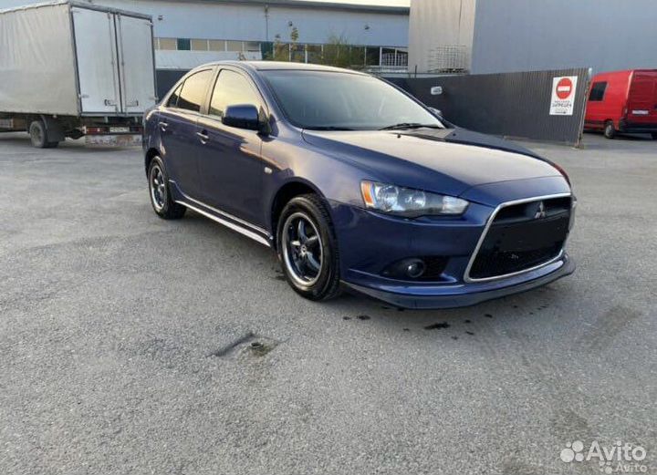 Передняя губа rallyart на Mitsubishi Lancer X