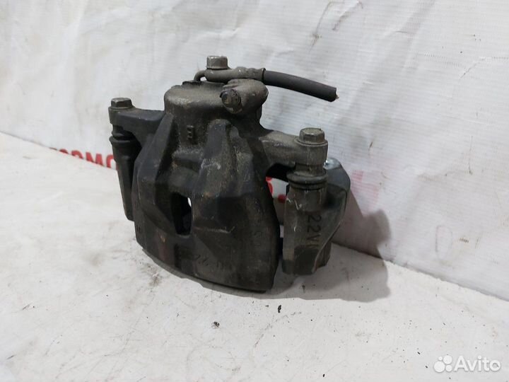 Суппорт тормозной передний левый Toyota Corolla