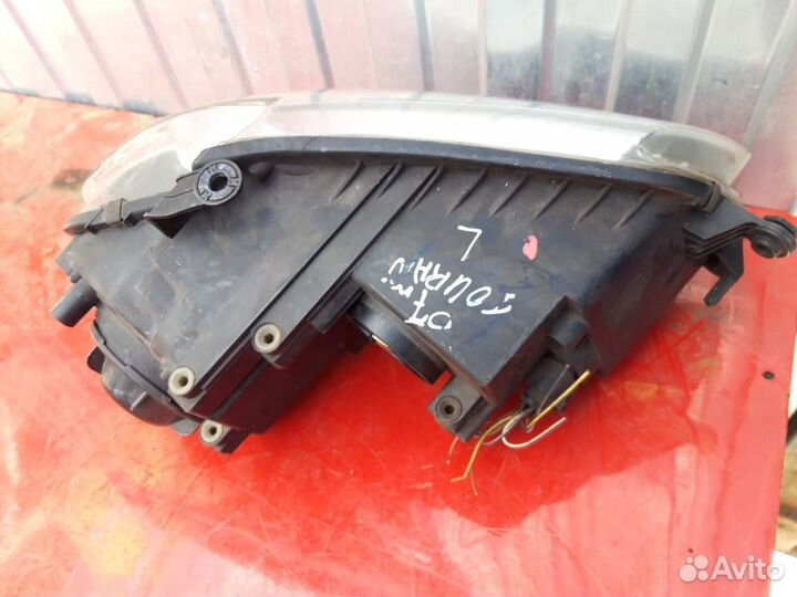 Фара левая Volkswagen Touran 2006-2010