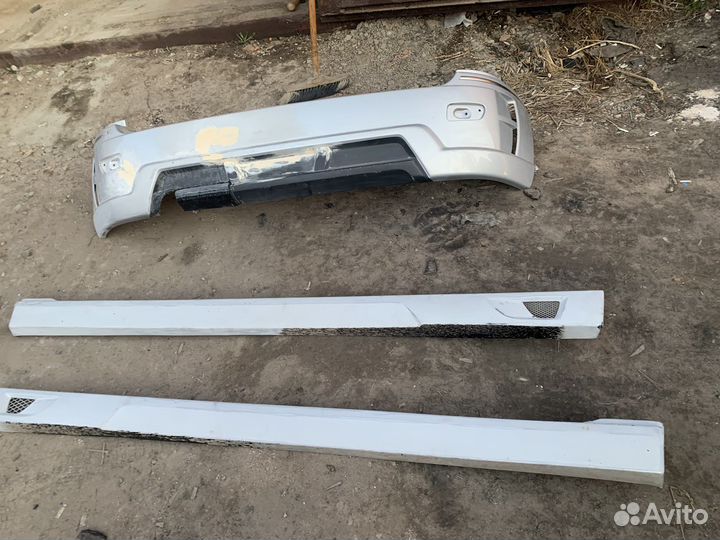 Бампер и накладки на пороги калина