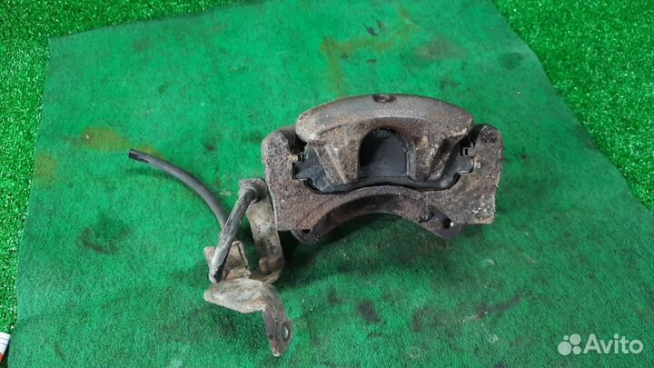 Суппорт тормозной передний правый Mitsubishi Outla