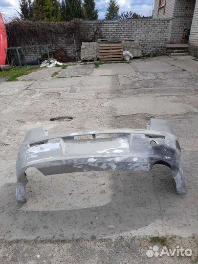 Задний бампер lancer 10