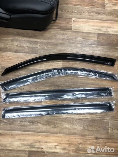 Ветровики Toyota LG 200