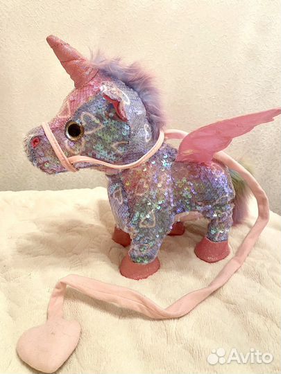 Игрушка Единорог в паетках музыкальный