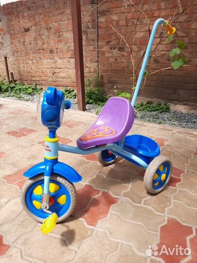 Трехколесный велосипед с ручкой
