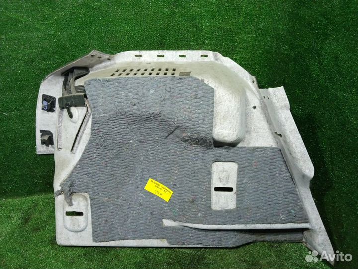 Обшивка багажника правая Opel Astra