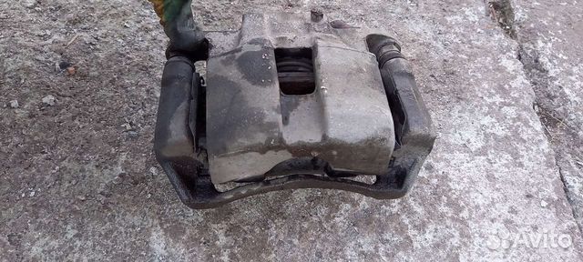 Суппорт передний левый Kia Soul, 58180-K0A50