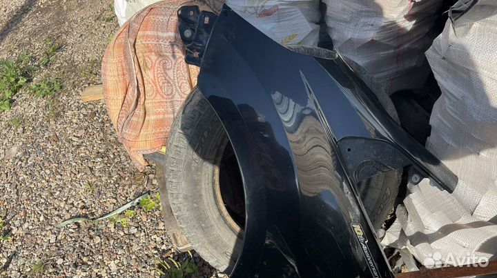 Крыло левое переднее honda fit