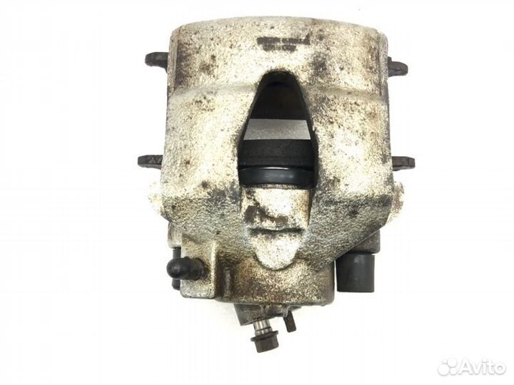 Суппорт тормозной передний левый Volkswagen Jetta