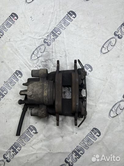 Суппорт передний левый Ford Focus 1