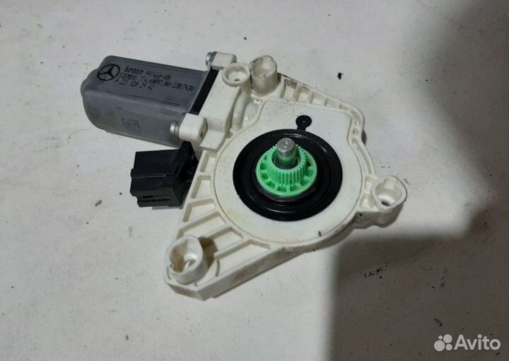 Моторчик стеклоподъемника задний левый