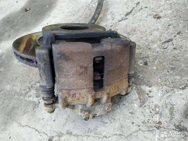 Суппорт тормозной передний левый GAZ Volga