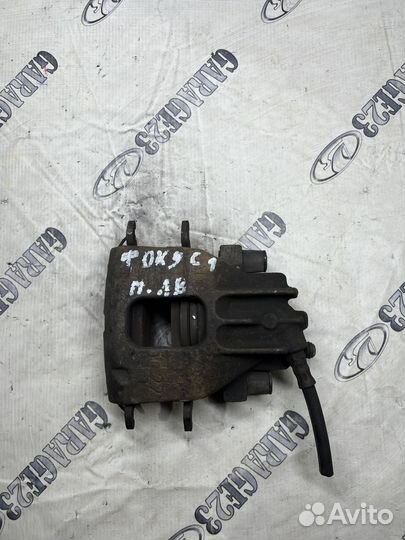 Суппорт передний левый Ford Focus 1