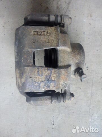 Суппорт передний Chevrolet Lacetti