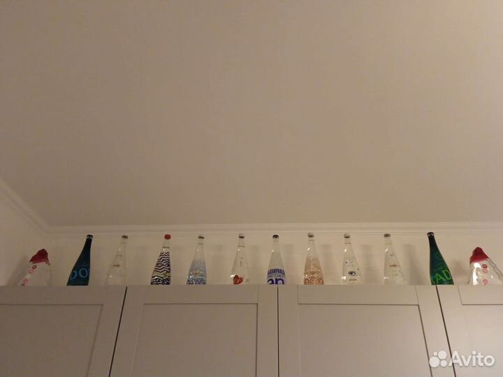 Коллекционные бутылки Evian