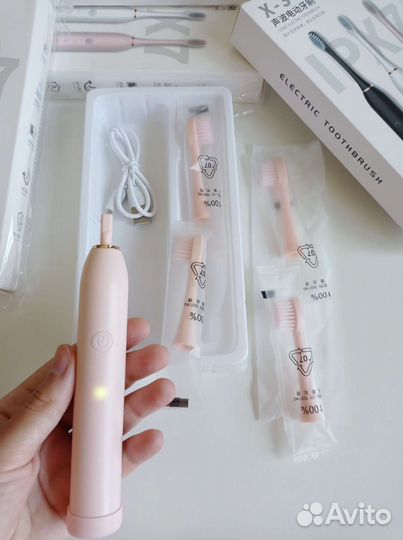 Электрическая зубная щетка новая