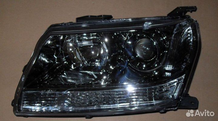Фара левая передняя левая Suzuki Grand Vitara