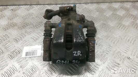 Суппорт тормозной задний правый opel astra H (GML2