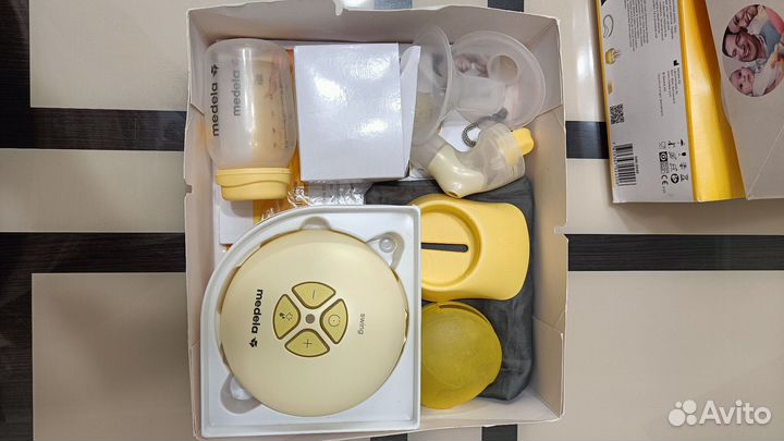 Молокоотсос medela swing электрический
