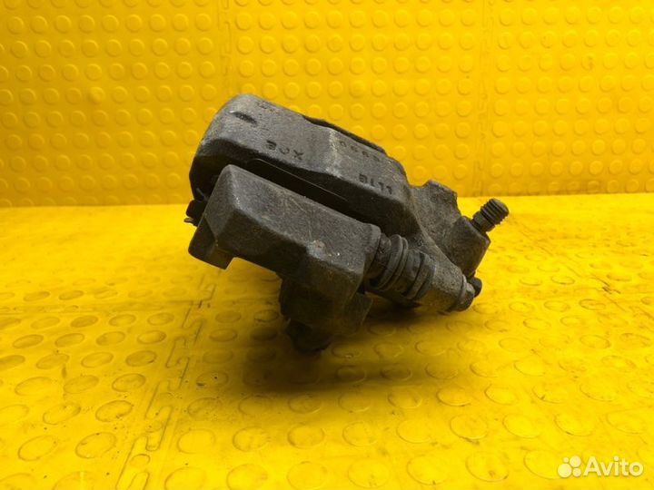 Суппорт тормозной передний левый Volkswagen Polo