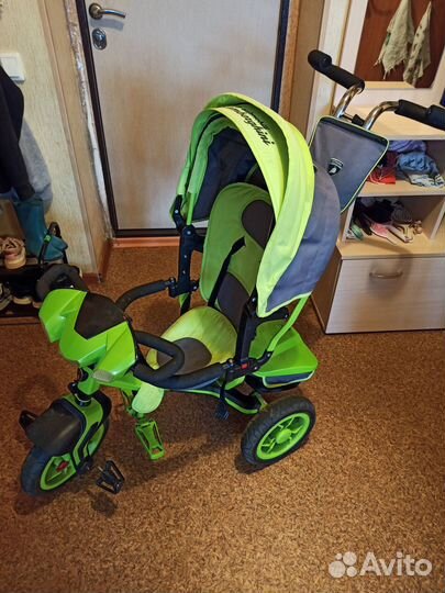 Трехколесный велосипед с ручкой