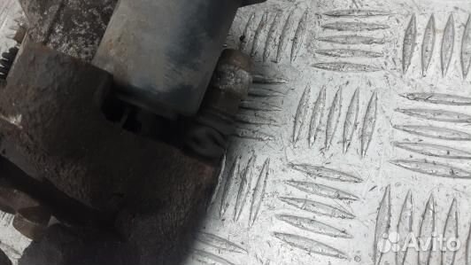 Суппорт тормозной задний левый hyundai I40 (TML01L