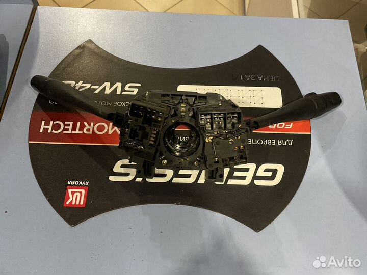 Переключатель поворотов и дворников Nissan Primera