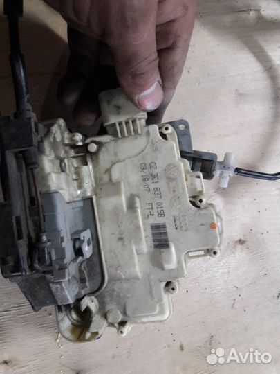 Замок двери передней фольксваген пассат б6