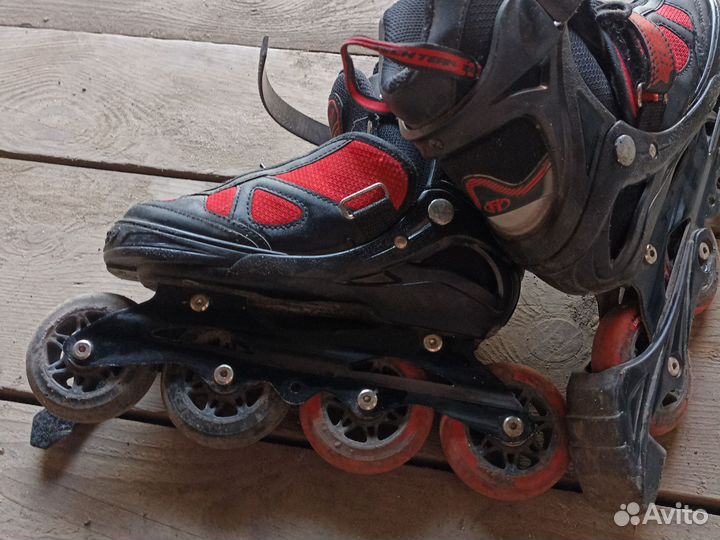 Роликовые коньки