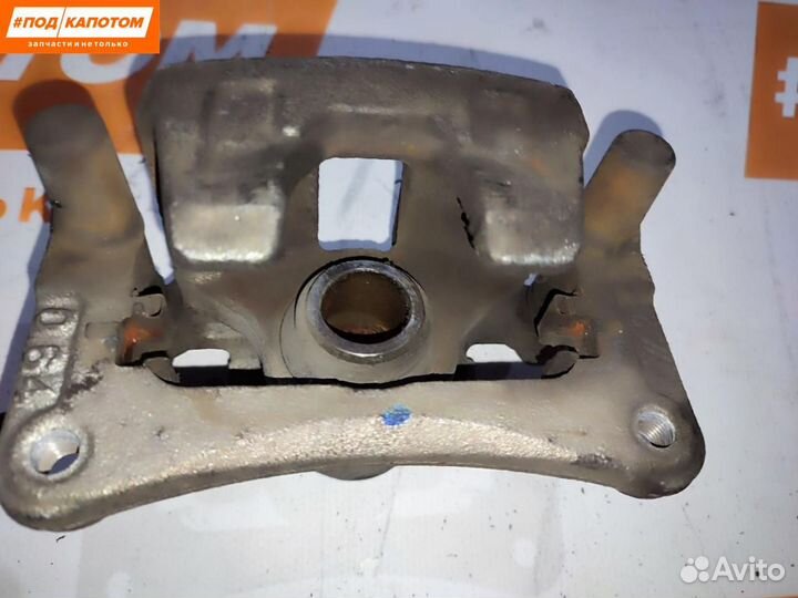 Суппорт тормозной задний левый Mitsubishi Lancer