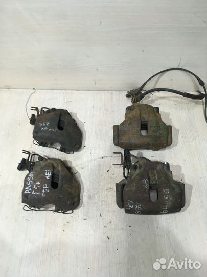 Суппорт тормозной передний левый Пассат Б5