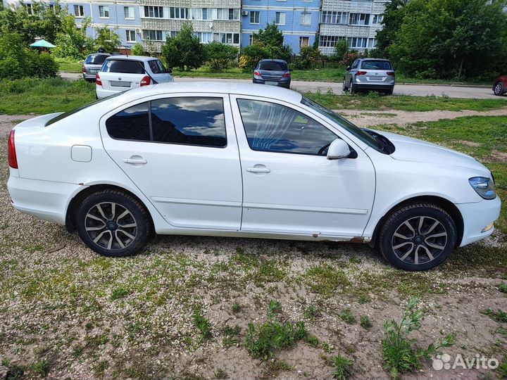 Skoda Octavia 1.8 МТ, 2012, 169 000 км