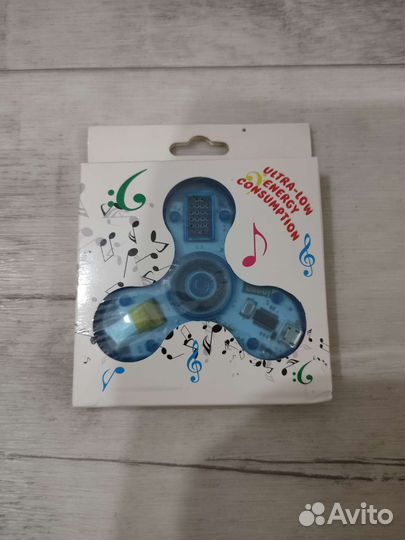 Спиннер bluetooth колонка