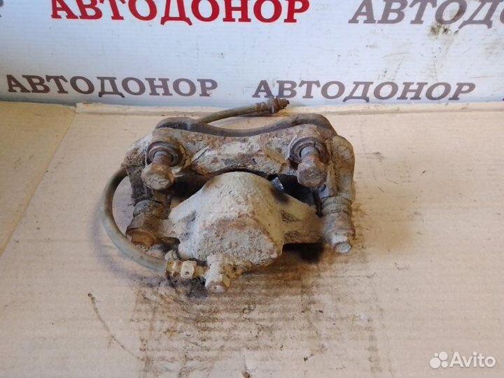 Суппорт тормозной передний левый Opel Frontera B