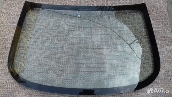 Стекло заднее Nissan Almera G15 2015г