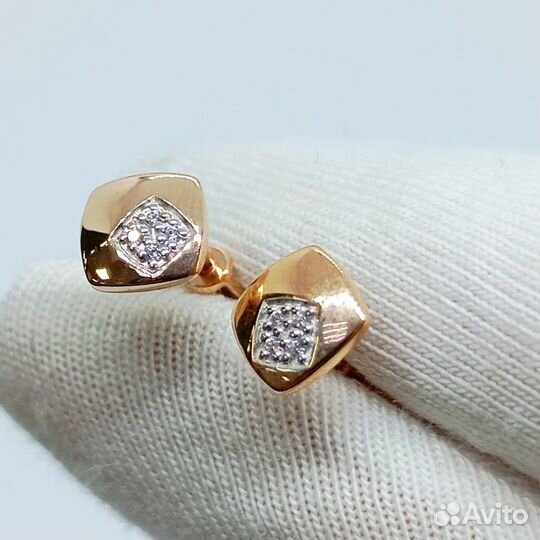 Золотые серьги с камнем