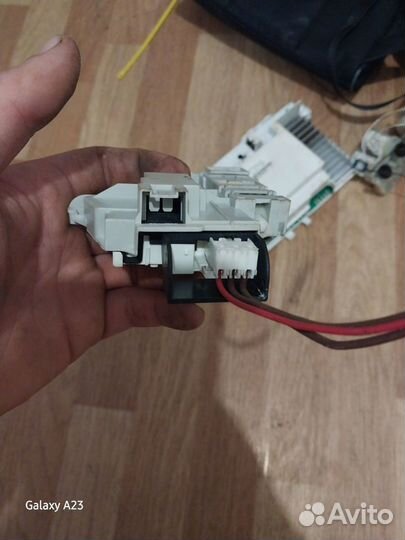 Устройство блокировки люка Hotpoint-Ariston