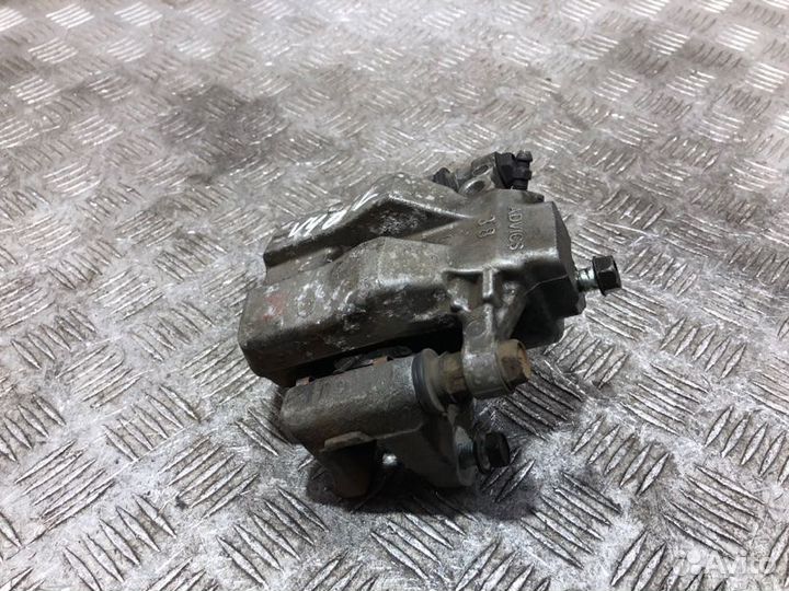 Суппорт тормозной задний левый Toyota Camry V40