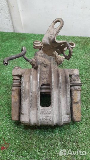 Суппорт задний левый Audi A3 8P 1.6 BSE (102 Л.С.)