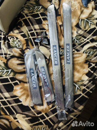 Накладки на пороги lancer 9